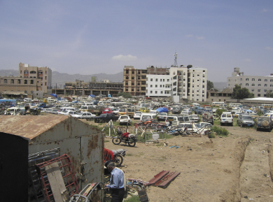 Hajajs` clothes are hung on swings while their families swing and sing in their absence. photo by Arwa Othman